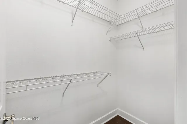 a view of a room with racks on the wall