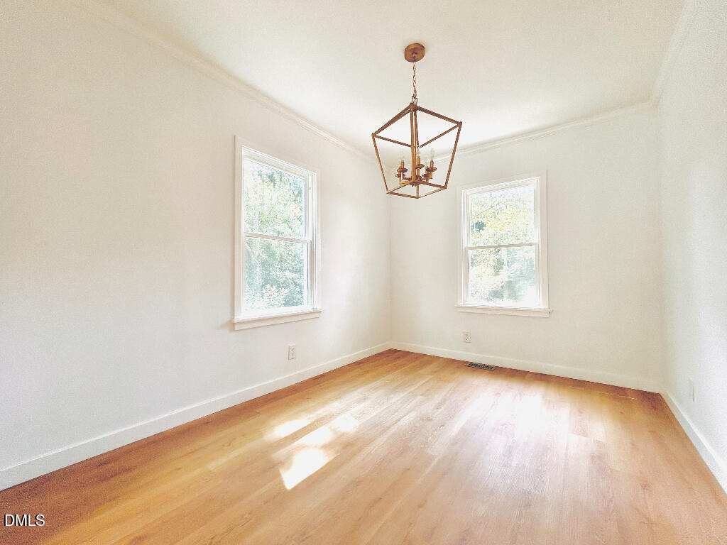 1606 James Street Durham, NC 27707 - Photo 7 of 24 an empty room with windows