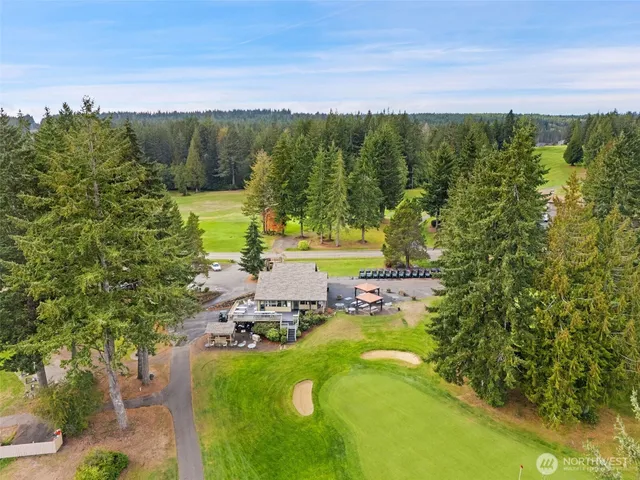 a view of a lake with a yard