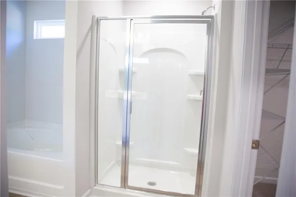 a close up of a bathtub curtain