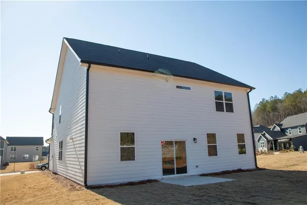 a front view of a house with garage