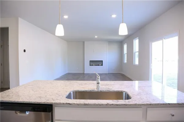 a bathroom with a sink vanity and a mirror