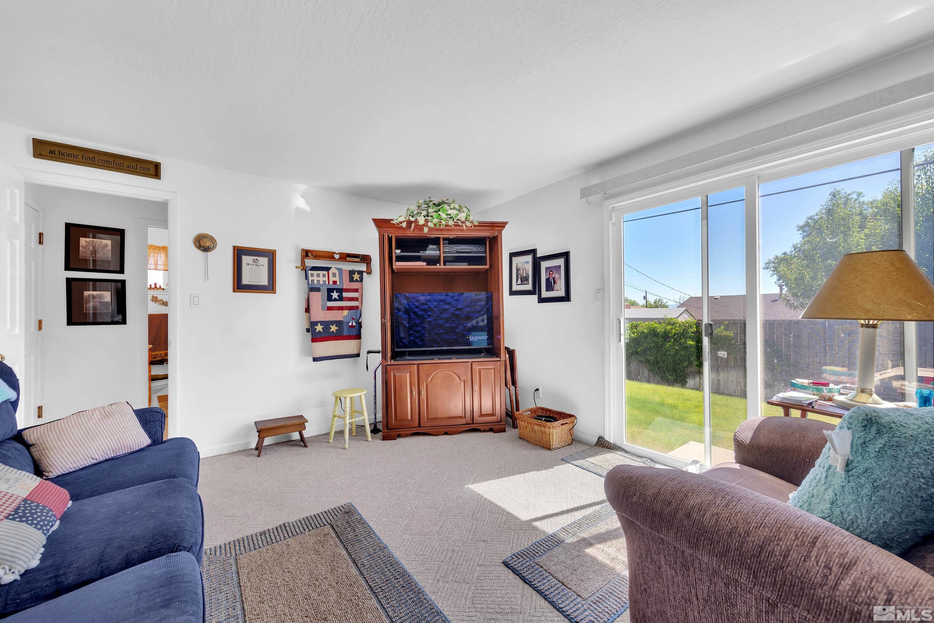 620 Nancy Circle Reno, NV 89503 - Photo 13 of 36 a living room with furniture and a window