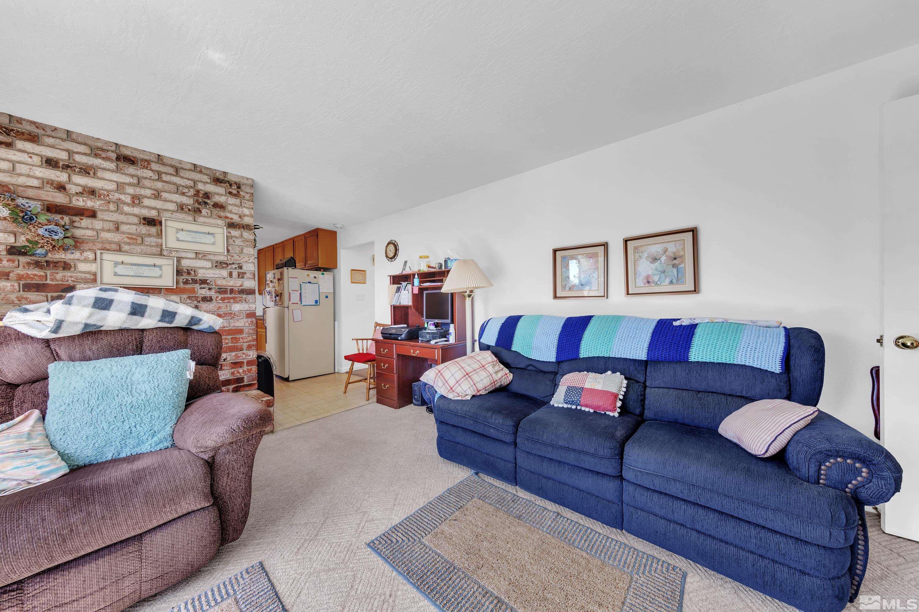620 Nancy Circle Reno, NV 89503 - Photo 14 of 36 a living room with furniture and a couch