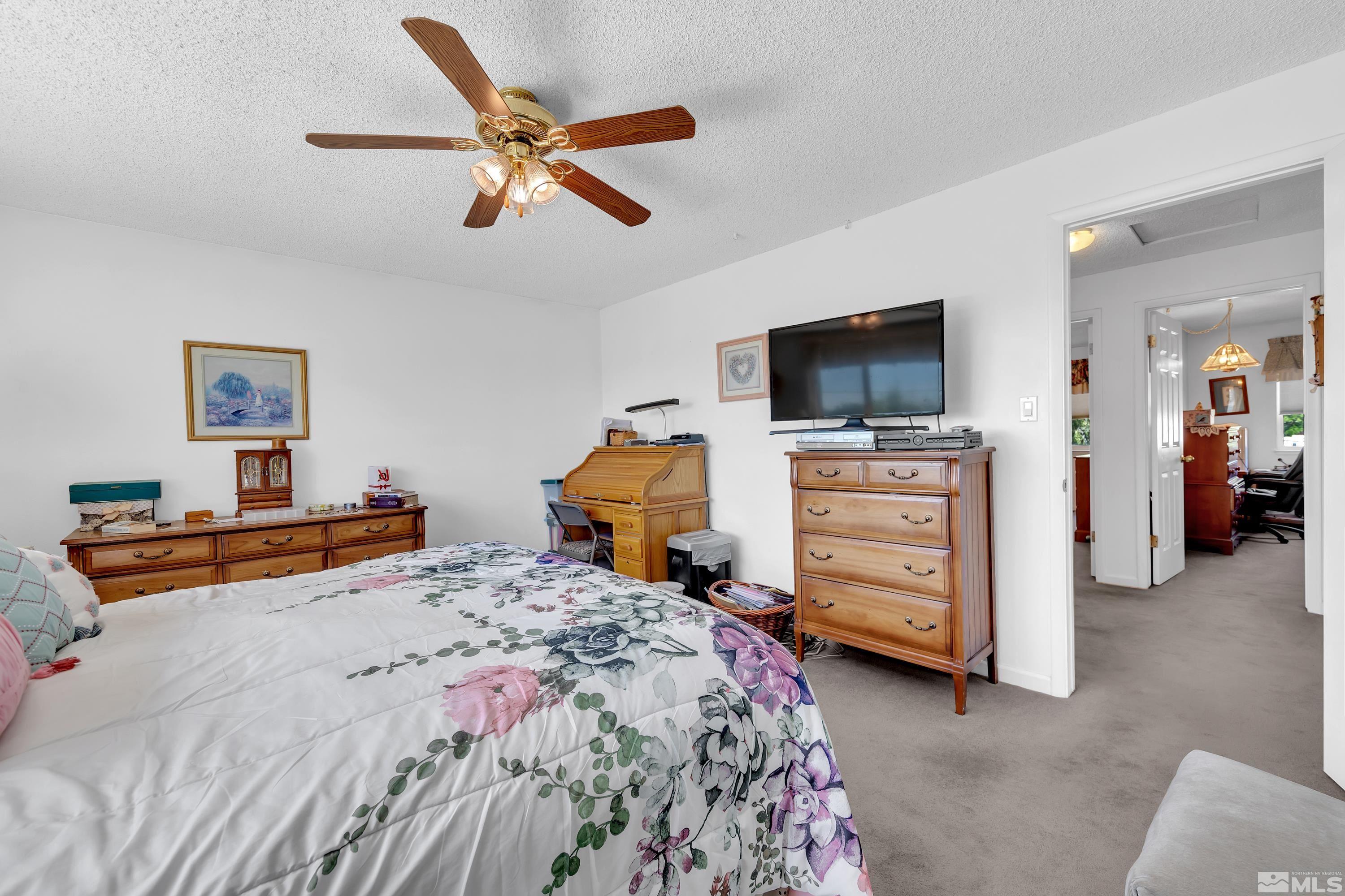 620 Nancy Circle Reno, NV 89503 - Photo 18 of 36 a bedroom with a bed and furniture