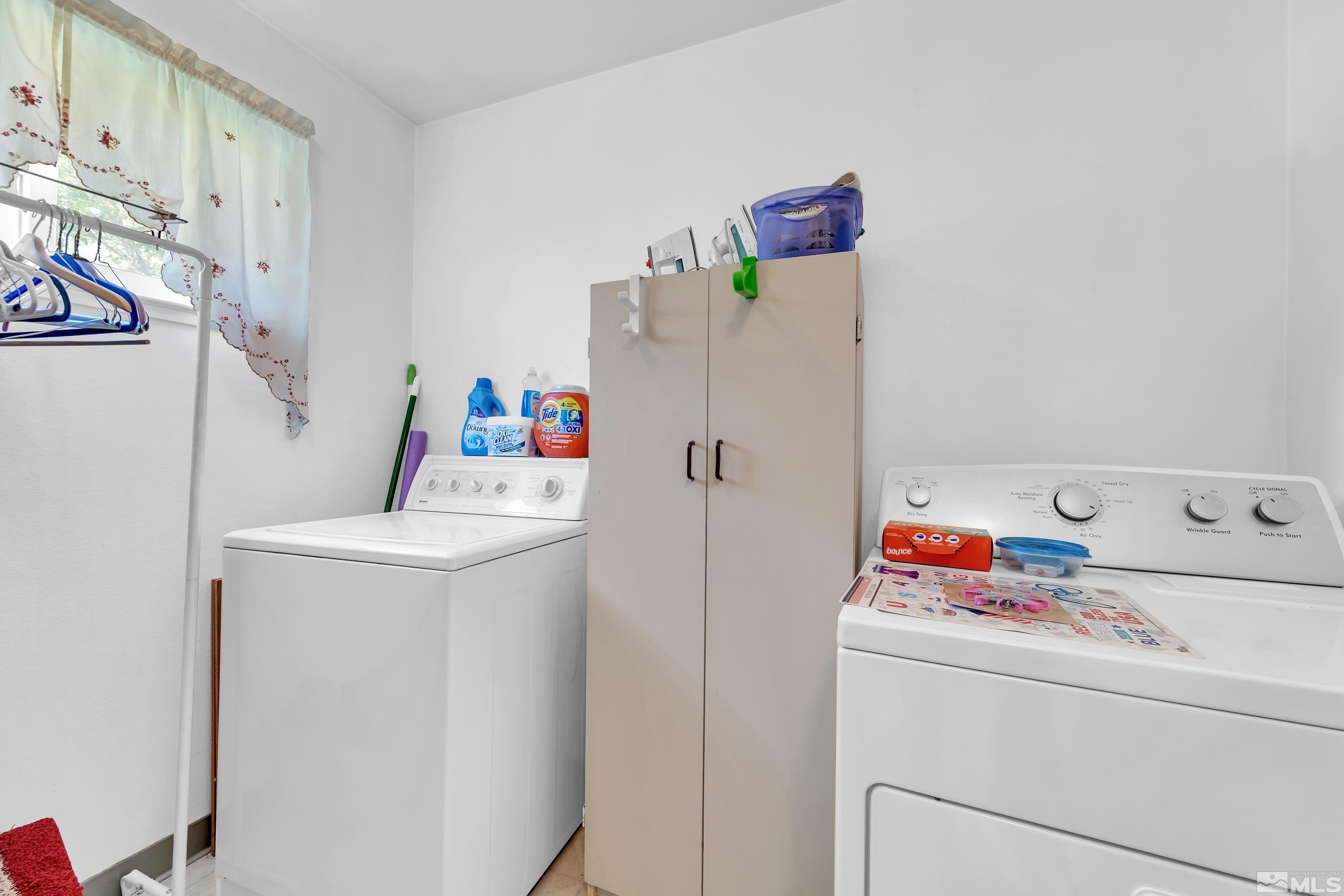620 Nancy Circle Reno, NV 89503 - Photo 26 of 36 a utility room with dryer and washer