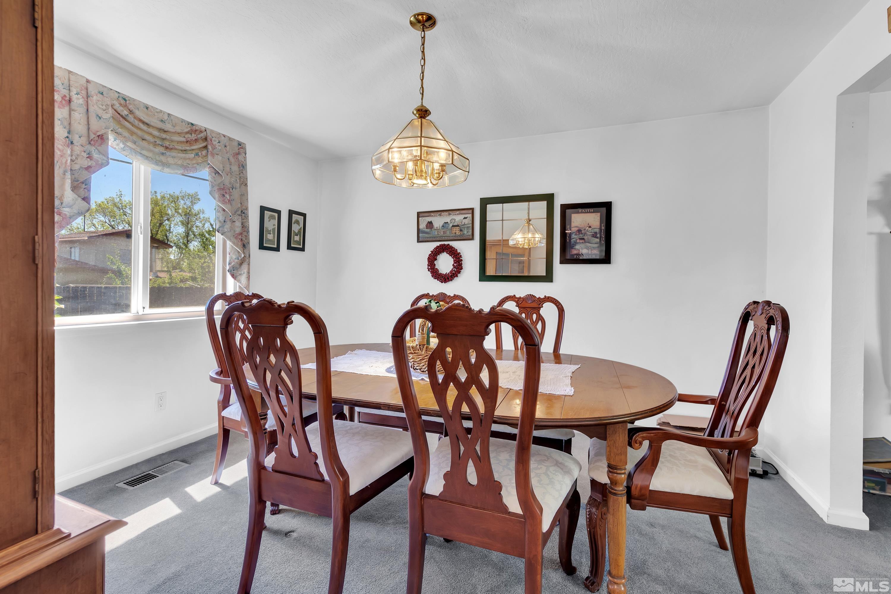 620 Nancy Circle Reno, NV 89503 - Photo 8 of 36 a dining room with furniture and window