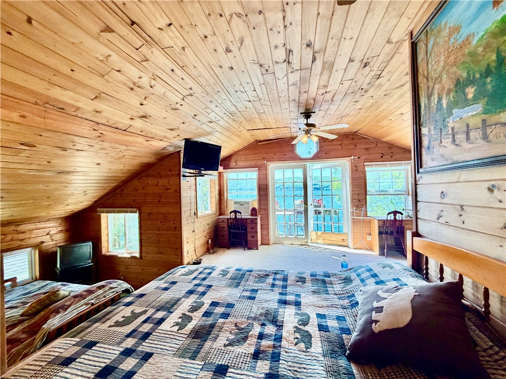 264 East Lake Road Middlesex, NY 14544 - Photo 24 of 50 2ND FLOOR BEDROOM WITH LAKE VIEWS