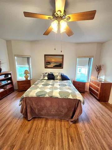 a bathroom with a shower sink and mirror