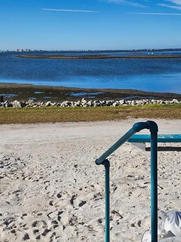 a view of a water fountain and fountain in the back