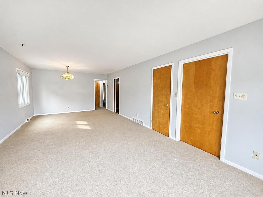 13630 Cedar Road, Unit LOWR University Heights, OH 44118 - Photo 4 of 19 living room looking at dining area