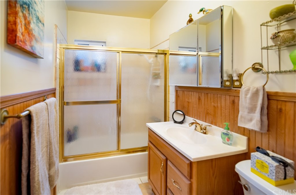 3708 West Victory Boulevard Burbank, CA 91505 - Photo 14 of 24 a bathroom with a sink and a mirror