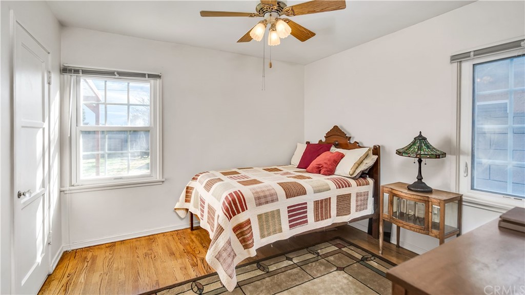 3708 West Victory Boulevard Burbank, CA 91505 - Photo 15 of 24 a bedroom with a bed and a chandelier