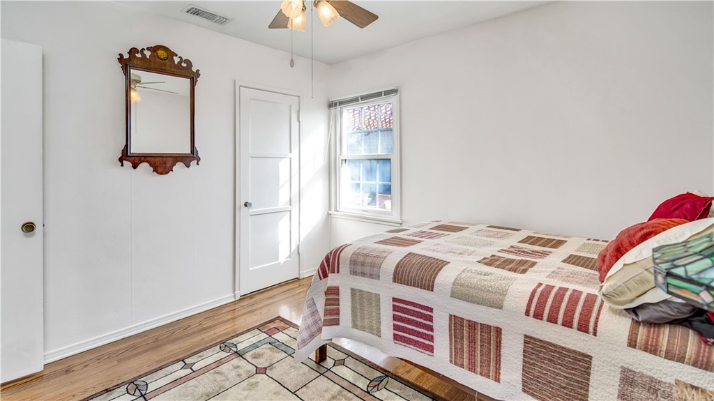 3708 West Victory Boulevard Burbank, CA 91505 - Photo 16 of 24 a bedroom with a bed and a window