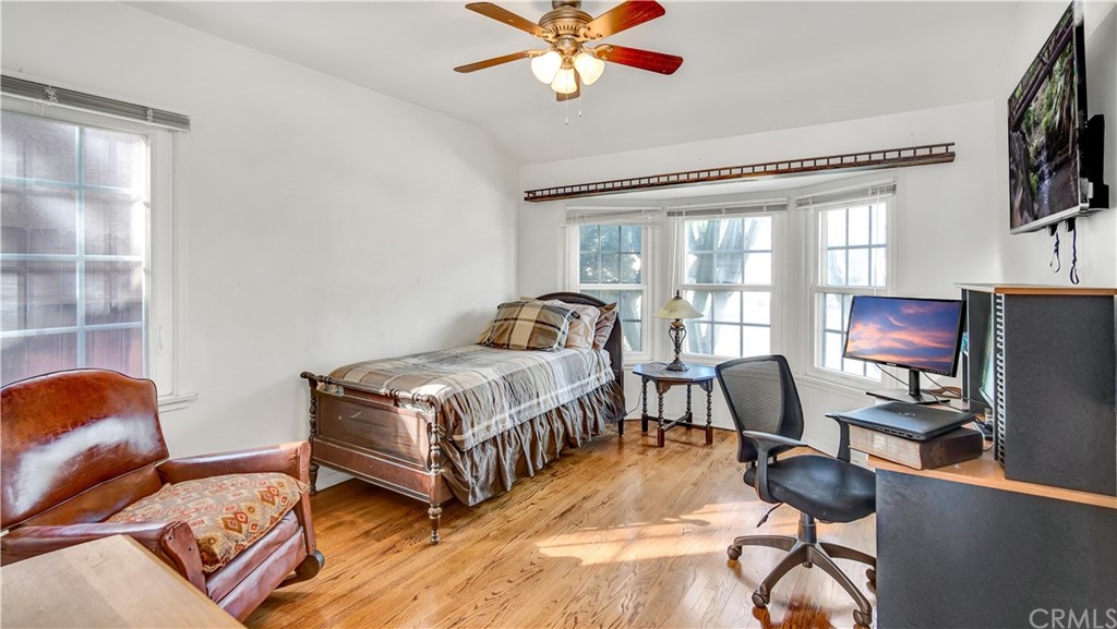 3708 West Victory Boulevard Burbank, CA 91505 - Photo 17 of 24 a bedroom with furniture and a window