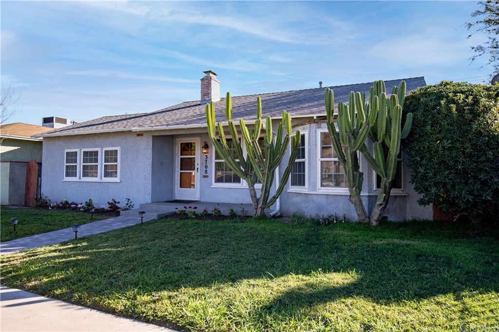 3708 West Victory Boulevard Burbank, CA 91505 - Photo 24 of 24 a front view of a house with garden