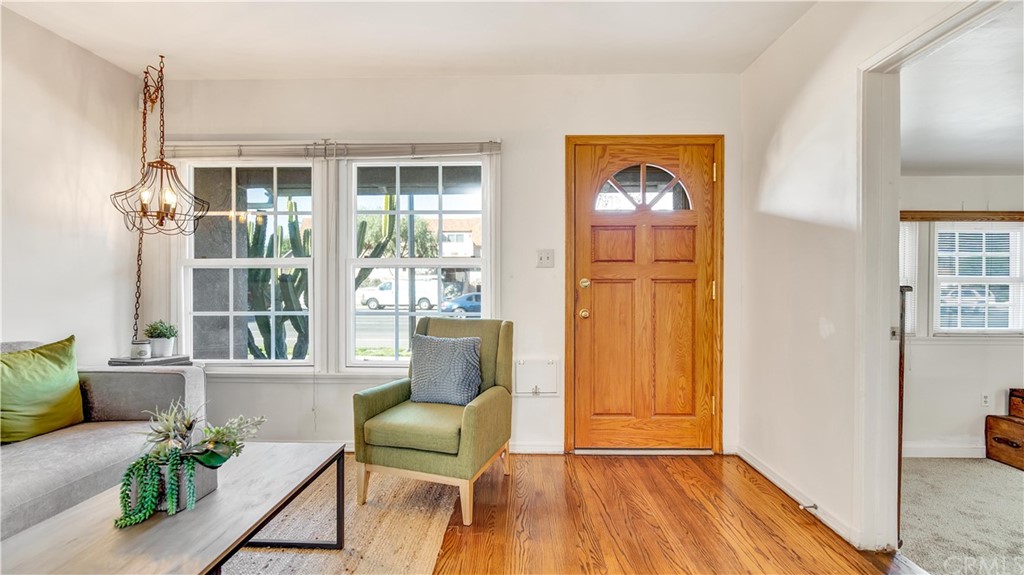3708 West Victory Boulevard Burbank, CA 91505 - Photo 4 of 24 a living room with furniture and a window