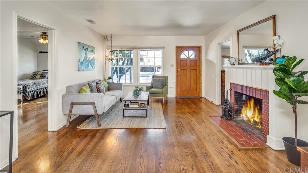 3708 West Victory Boulevard Burbank, CA 91505 - Photo 7 of 24 a living room with furniture and a fireplace