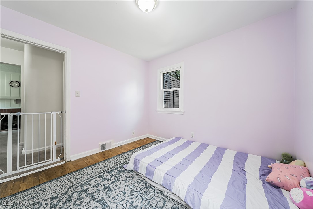 1607 Richmond Road Cleveland, OH 44124 - Photo 15 of 32 Bedroom with hardwood / wood-style floors