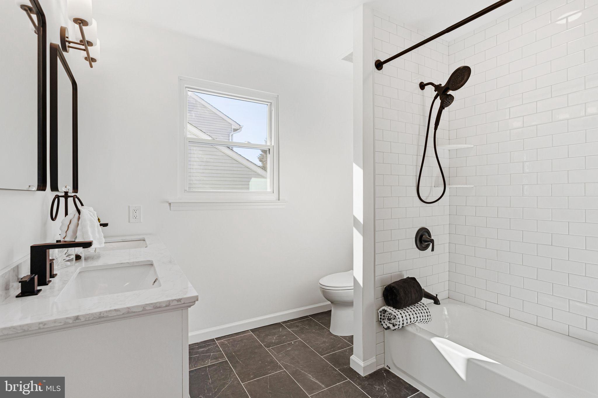 15162 Wayside Road Philadelphia, PA 19116 - Photo 28 of 34 a bathroom with a sink toilet and shower