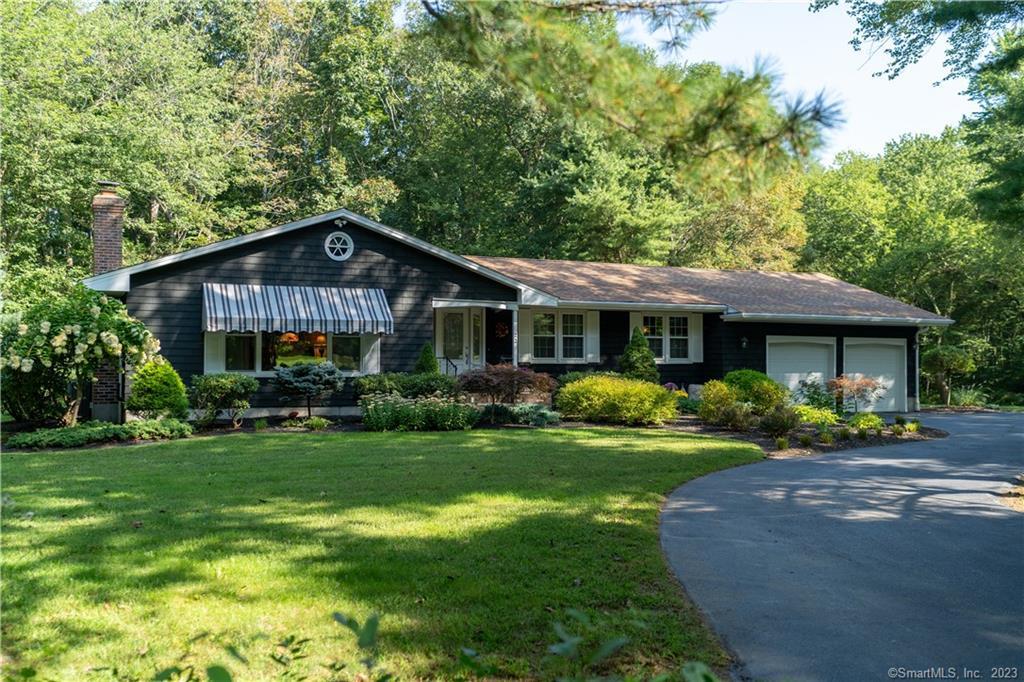 23 Silas Deane Road Ledyard, CT 06339 - Photo 1 of 1 a front view of a house with a yard