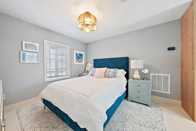 a room with a window and a bathroom