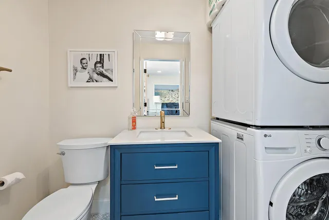 a view of a house with swimming pool and yard