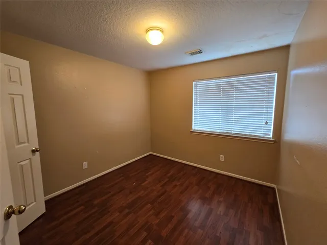 a bathroom with a sink a toilet and a tub