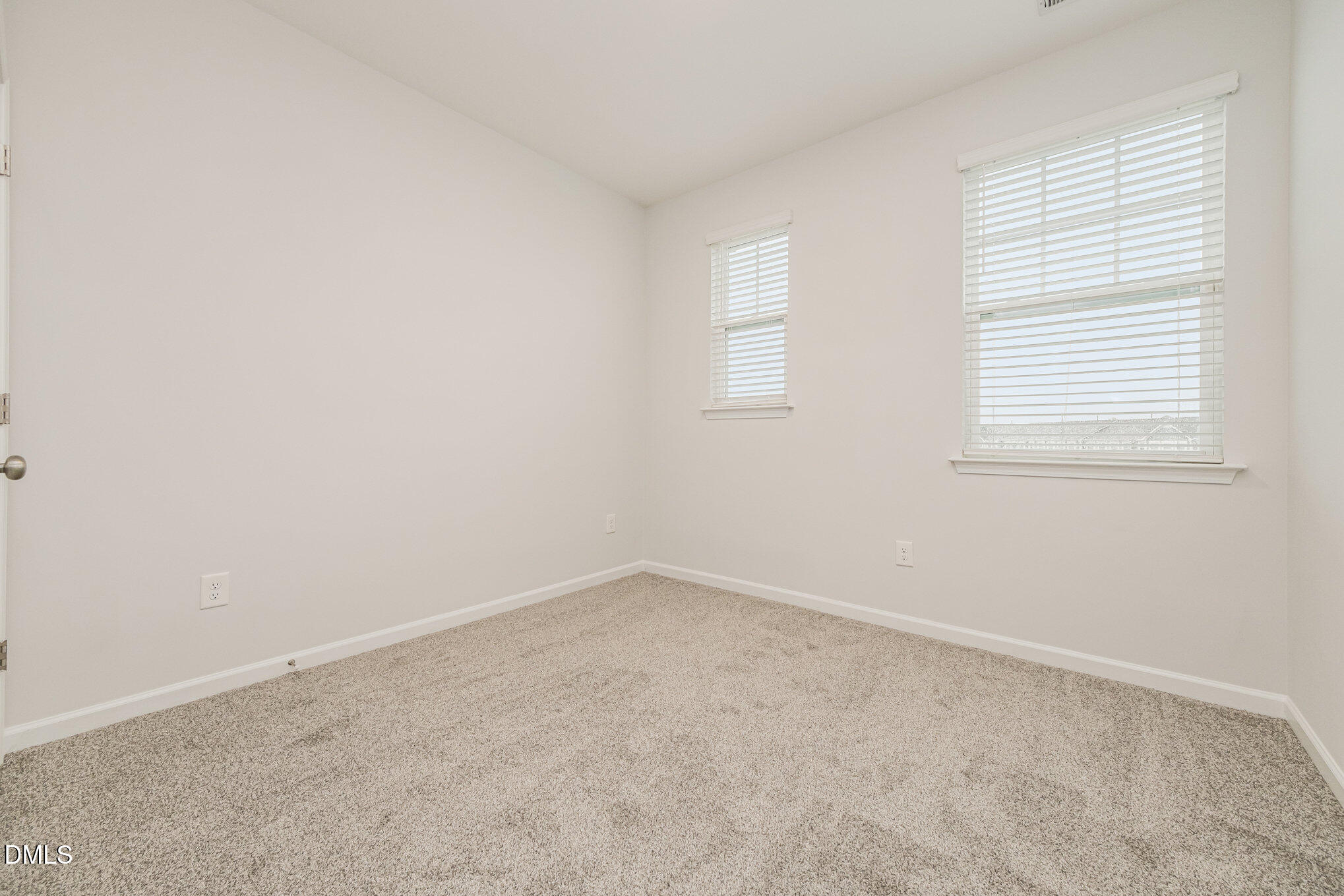1019 Islip Place Durham, NC 27703 - Photo 11 of 18 an empty room with a window