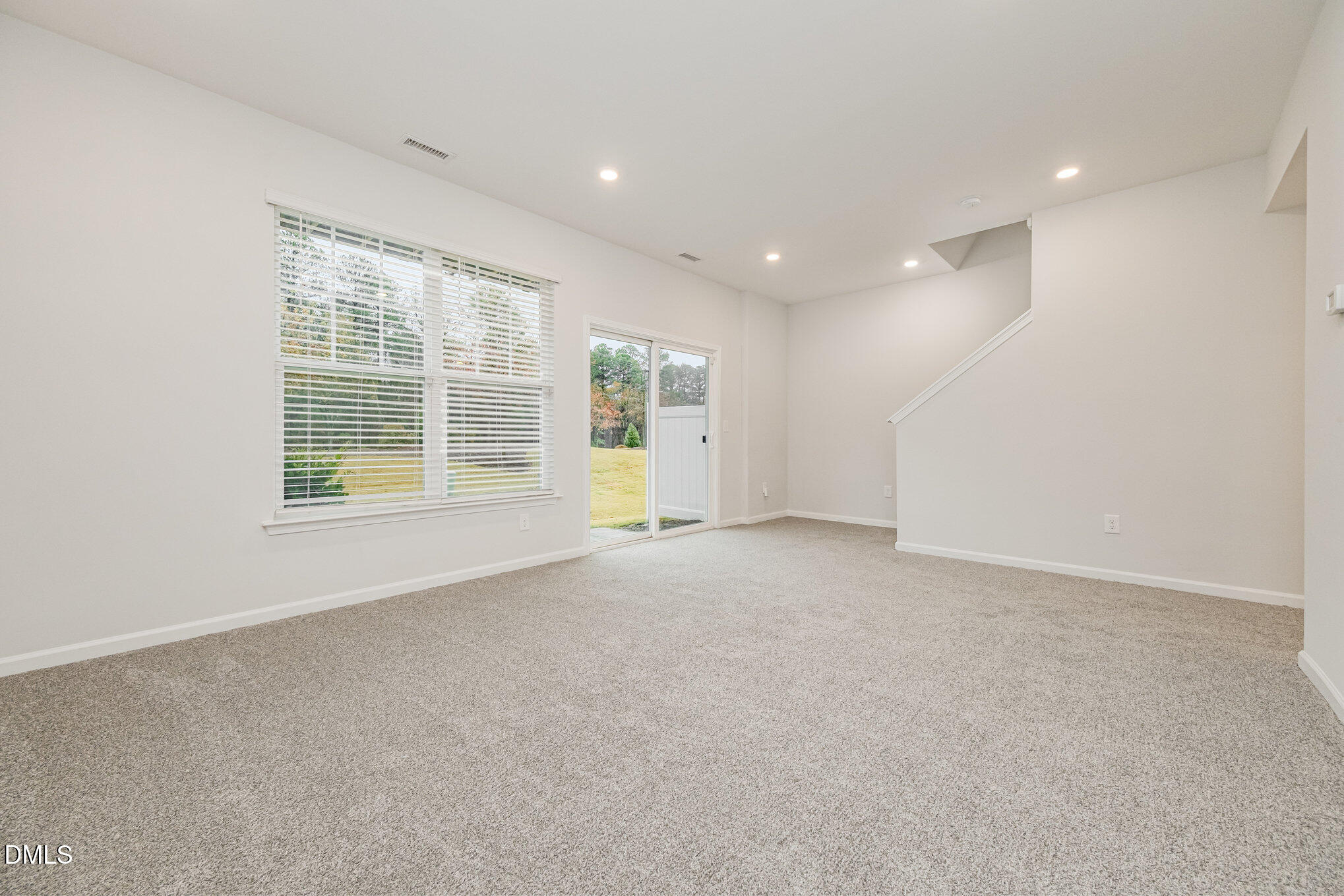 1019 Islip Place Durham, NC 27703 - Photo 14 of 18 a view of an empty room with a window