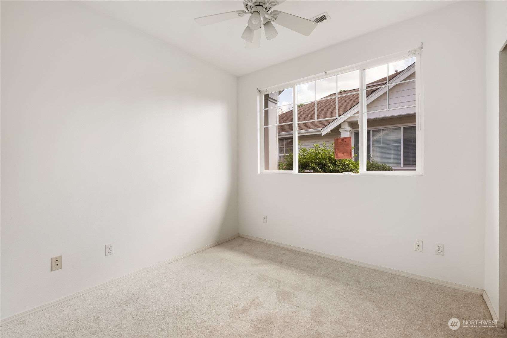 2300 Benson Road South, Unit H1 Renton, WA 98055 - Photo 16 of 27 an empty room with a window