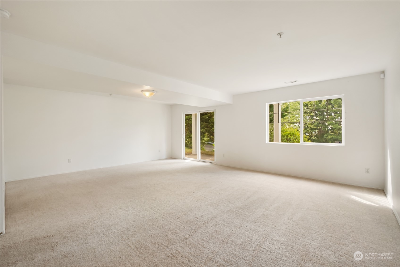 2300 Benson Road South, Unit H1 Renton, WA 98055 - Photo 19 of 27 an empty room with windows