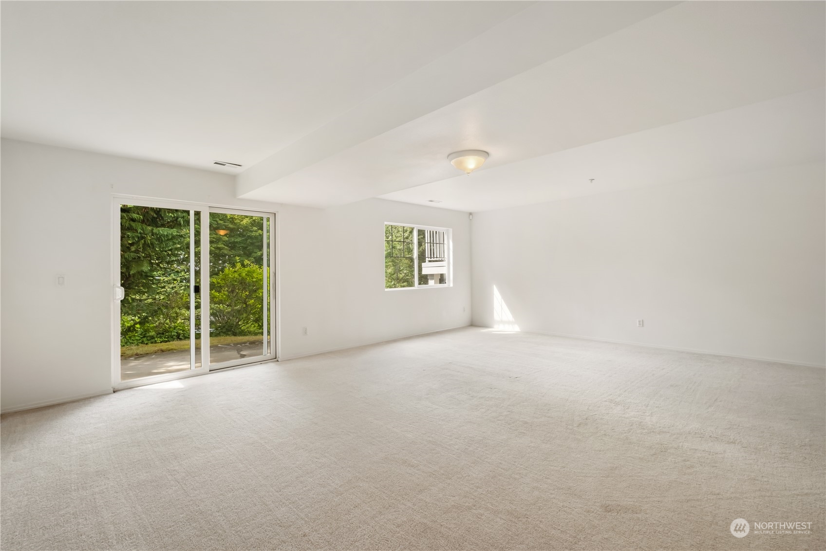 2300 Benson Road South, Unit H1 Renton, WA 98055 - Photo 20 of 27 an empty room with windows