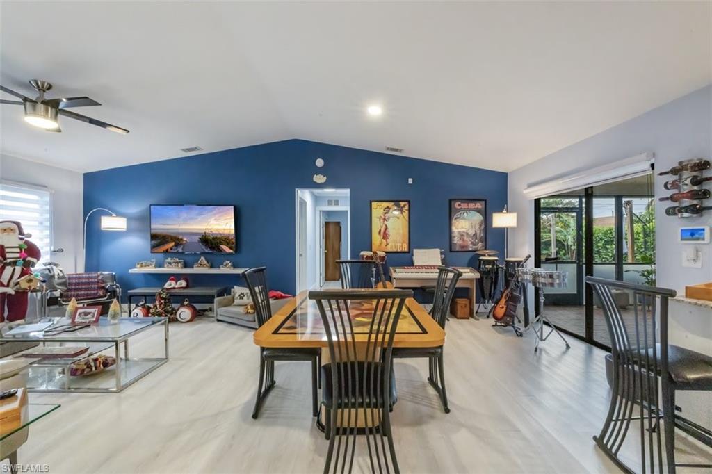 4228 31st Place Southwest Naples, FL 34116 - Photo 12 of 28 a view of a livingroom with furniture window and outside view