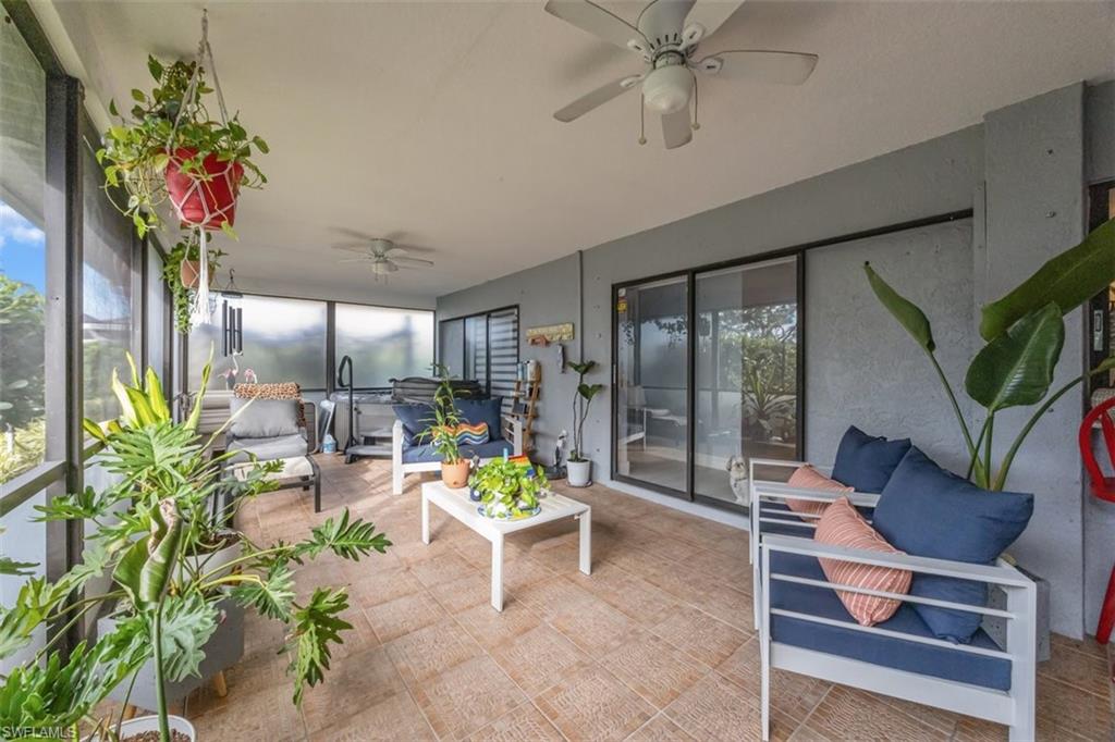 4228 31st Place Southwest Naples, FL 34116 - Photo 22 of 28 a living room filled with furniture