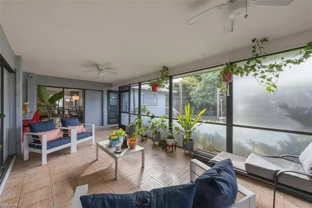 a view of a chair and table in the garden