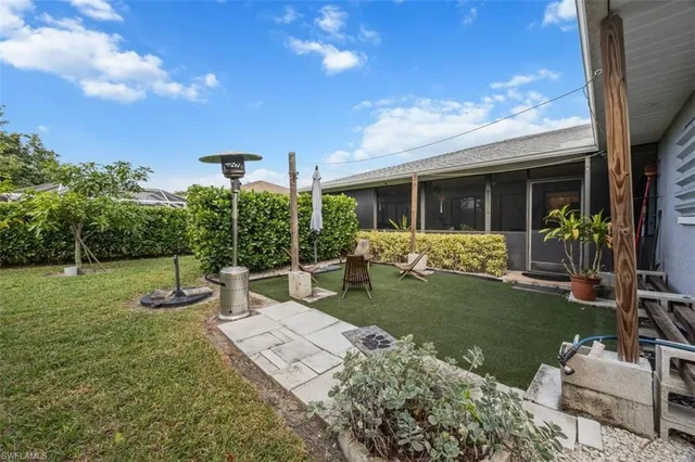 a table and chairs in the garden