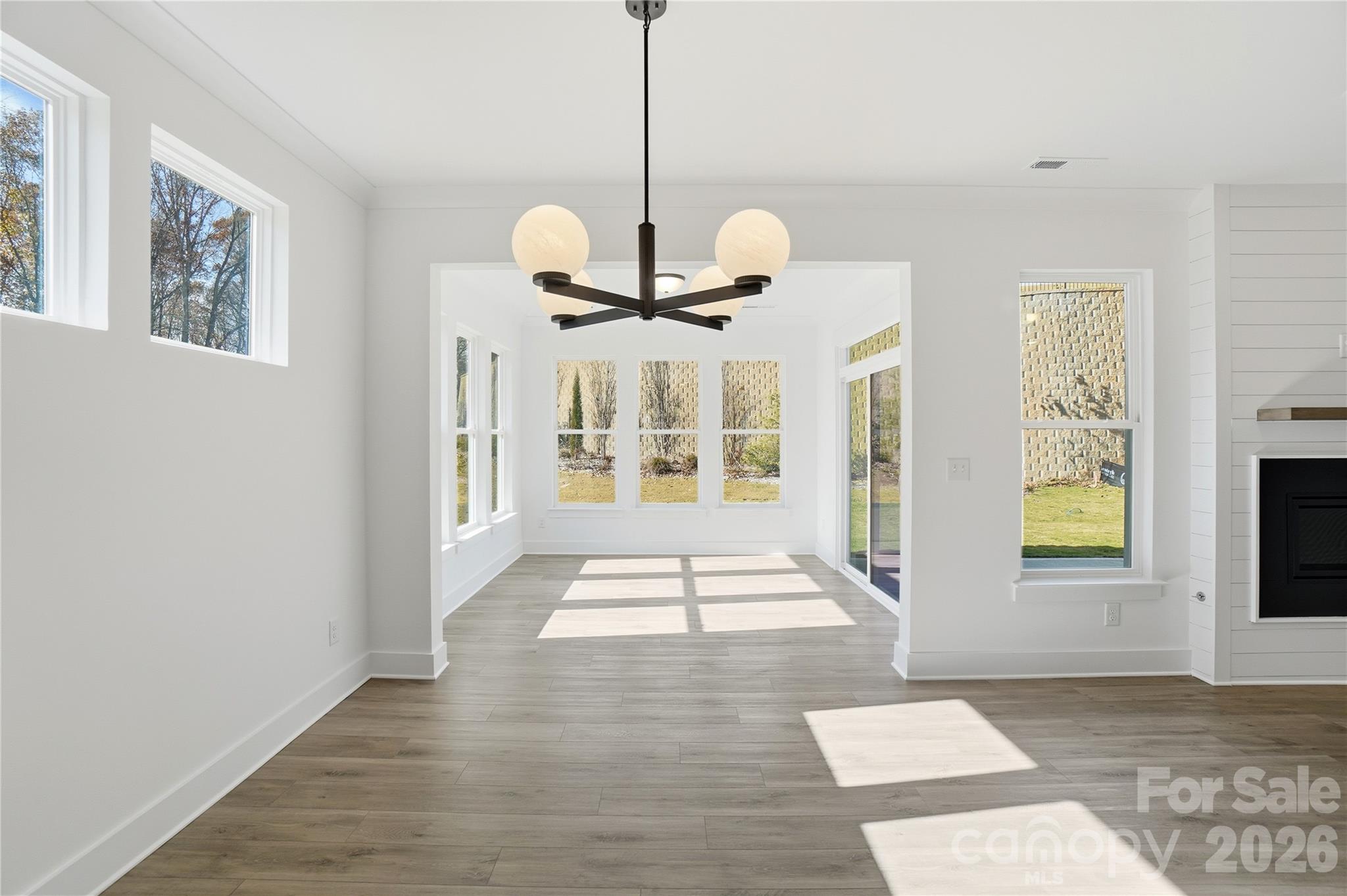 107 Longwood Road Mooresville, NC 28115 - Photo 11 of 43 a view of an entryway with wooden floor