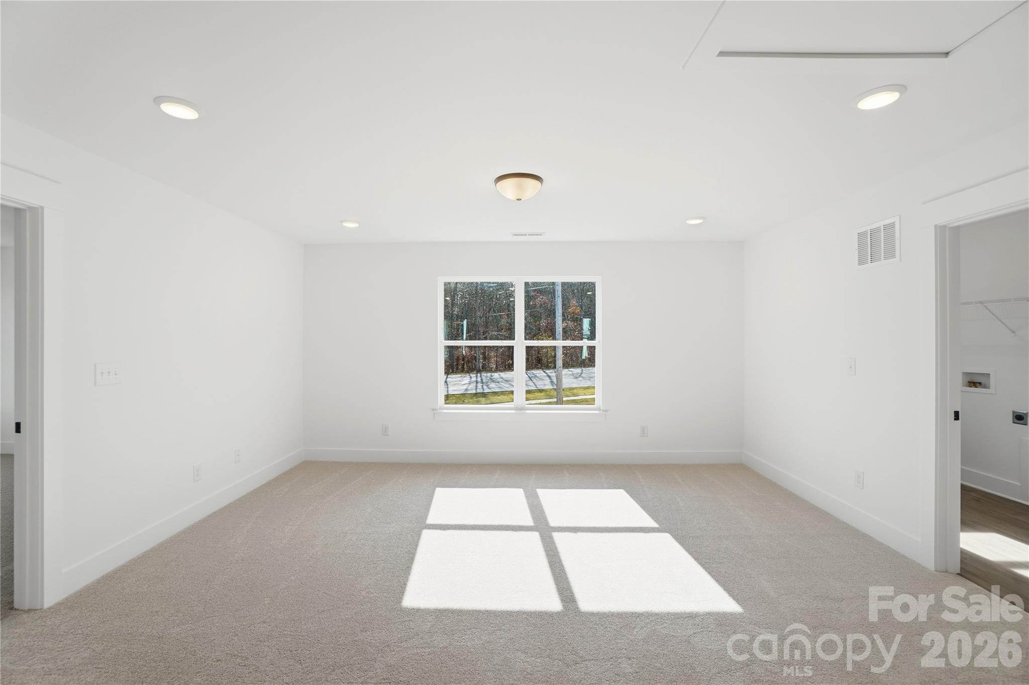 107 Longwood Road Mooresville, NC 28115 - Photo 24 of 43 a view of an empty room with a window