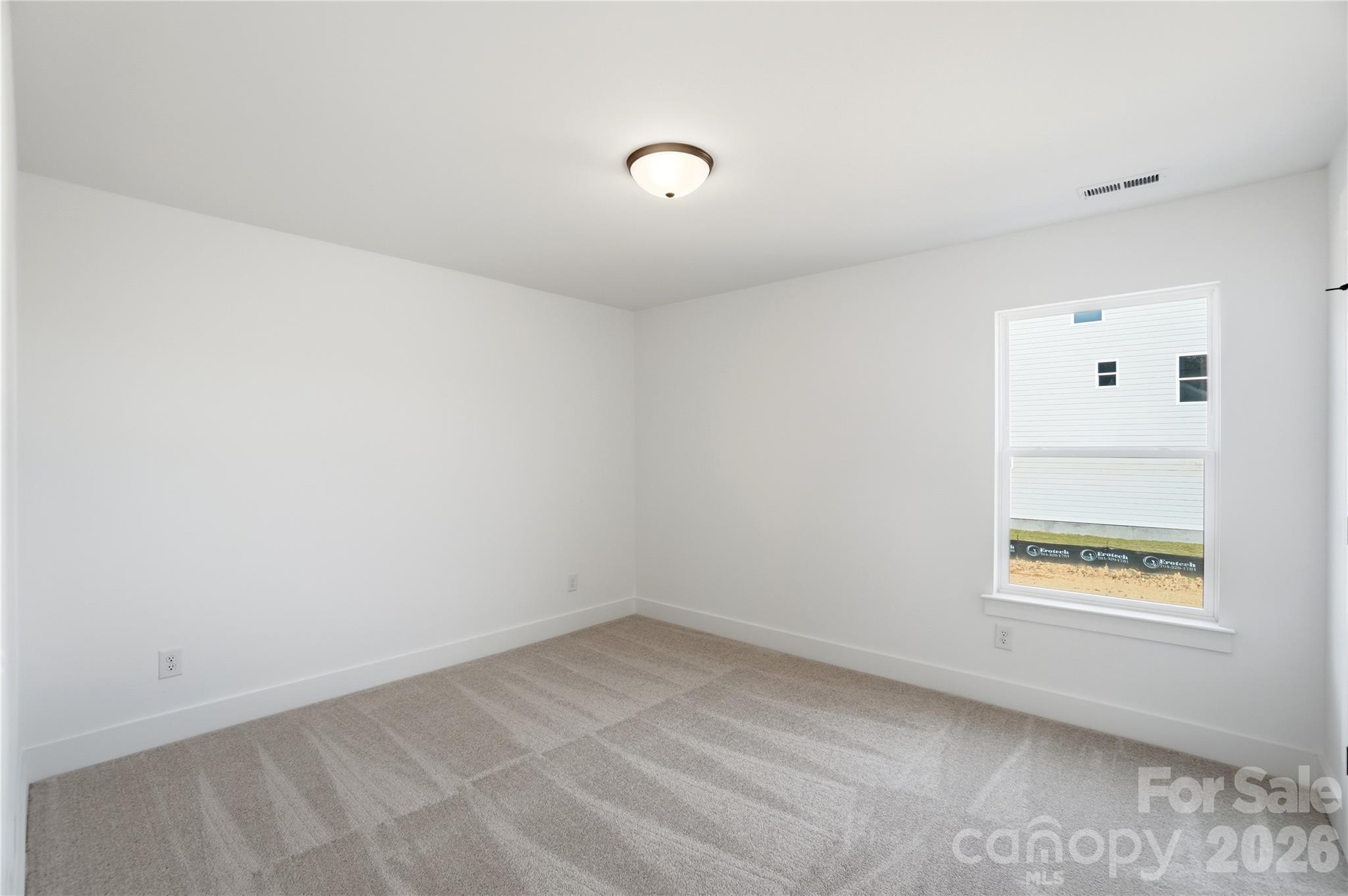 107 Longwood Road Mooresville, NC 28115 - Photo 38 of 43 an empty room with a window