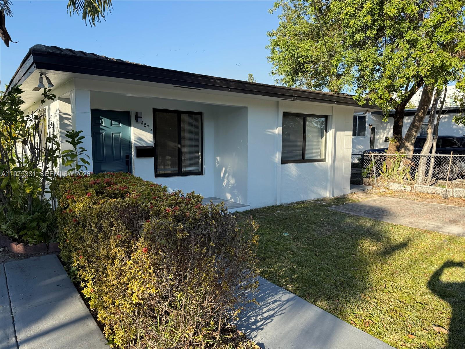 a house view with a outdoor space