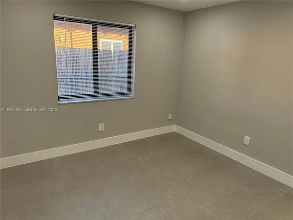 an empty room with a window
