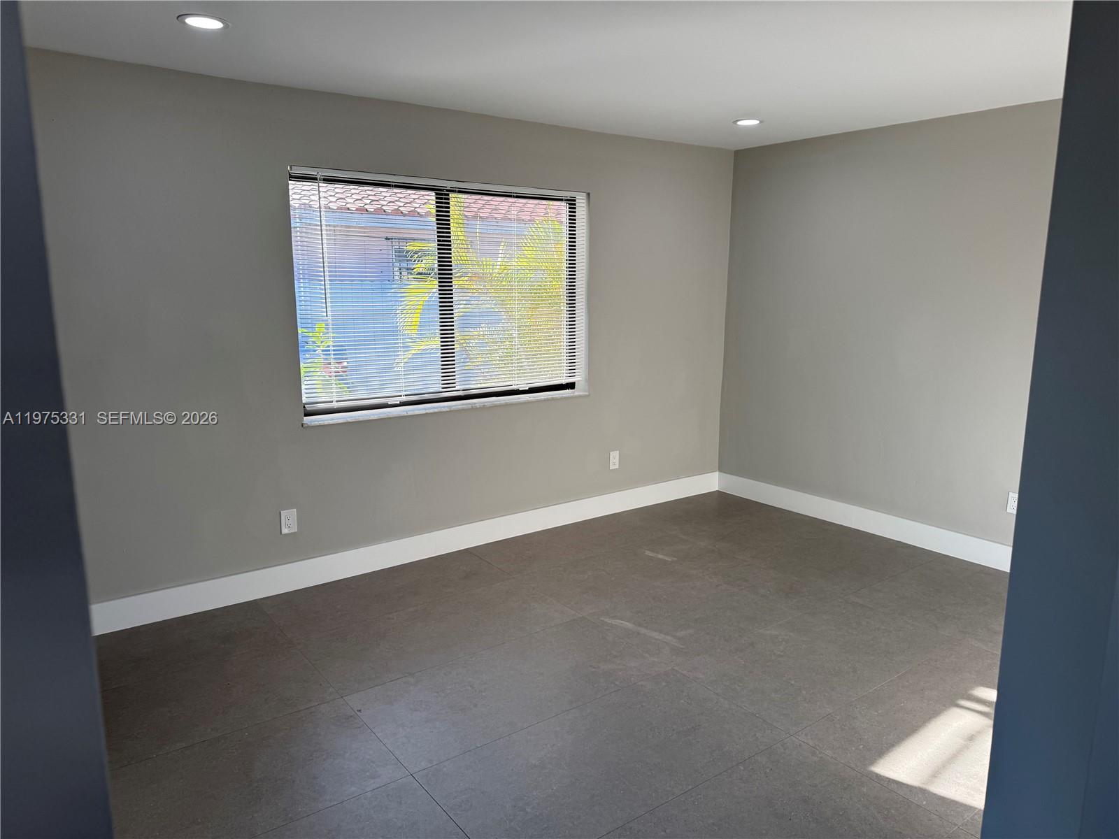 3275 Southwest 27th Street, Unit 3275 Miami, FL 33133 - Photo 16 of 17 an empty room with windows