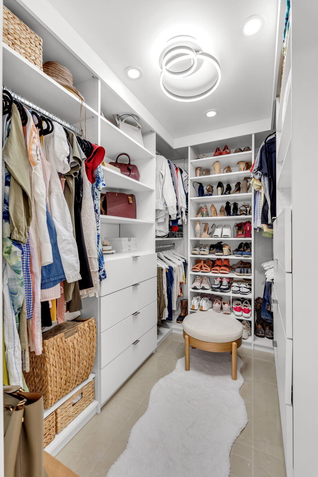 11290 Southwest 48th Street Miami, FL 33165 - Photo 21 of 53 a view of walk in closet with clothes and shoes