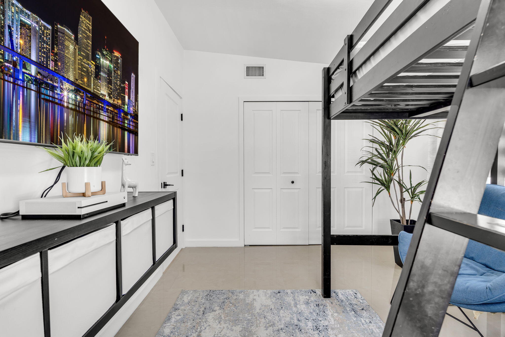 11290 Southwest 48th Street Miami, FL 33165 - Photo 25 of 53 a view of a hallway with wooden floor and glass top table