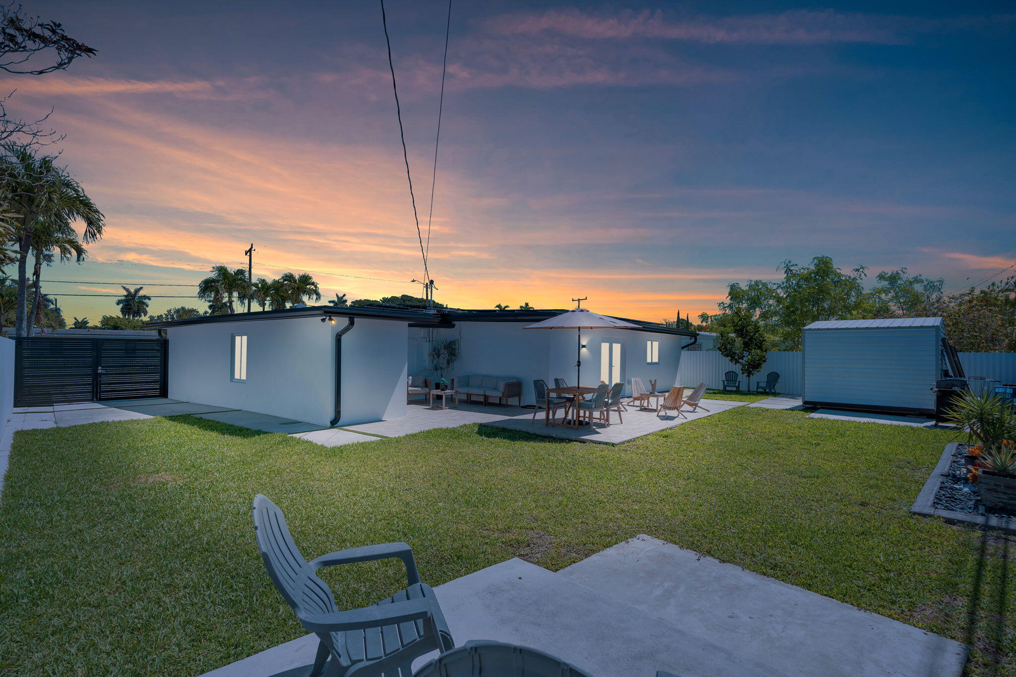 11290 Southwest 48th Street Miami, FL 33165 - Photo 3 of 53 a view of a house with backyard porch and sitting area
