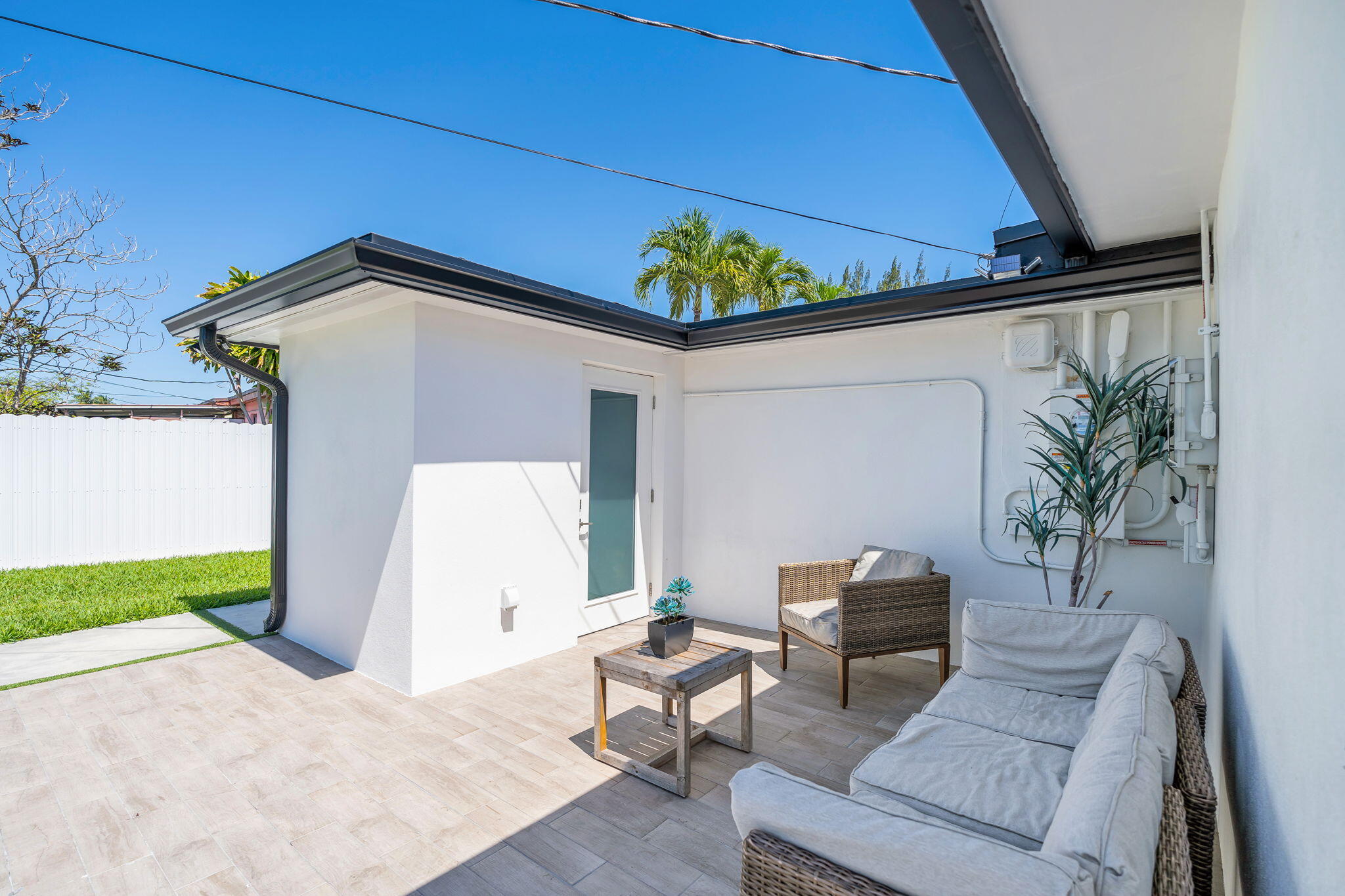 11290 Southwest 48th Street Miami, FL 33165 - Photo 37 of 53 a backyard of a house with seating space