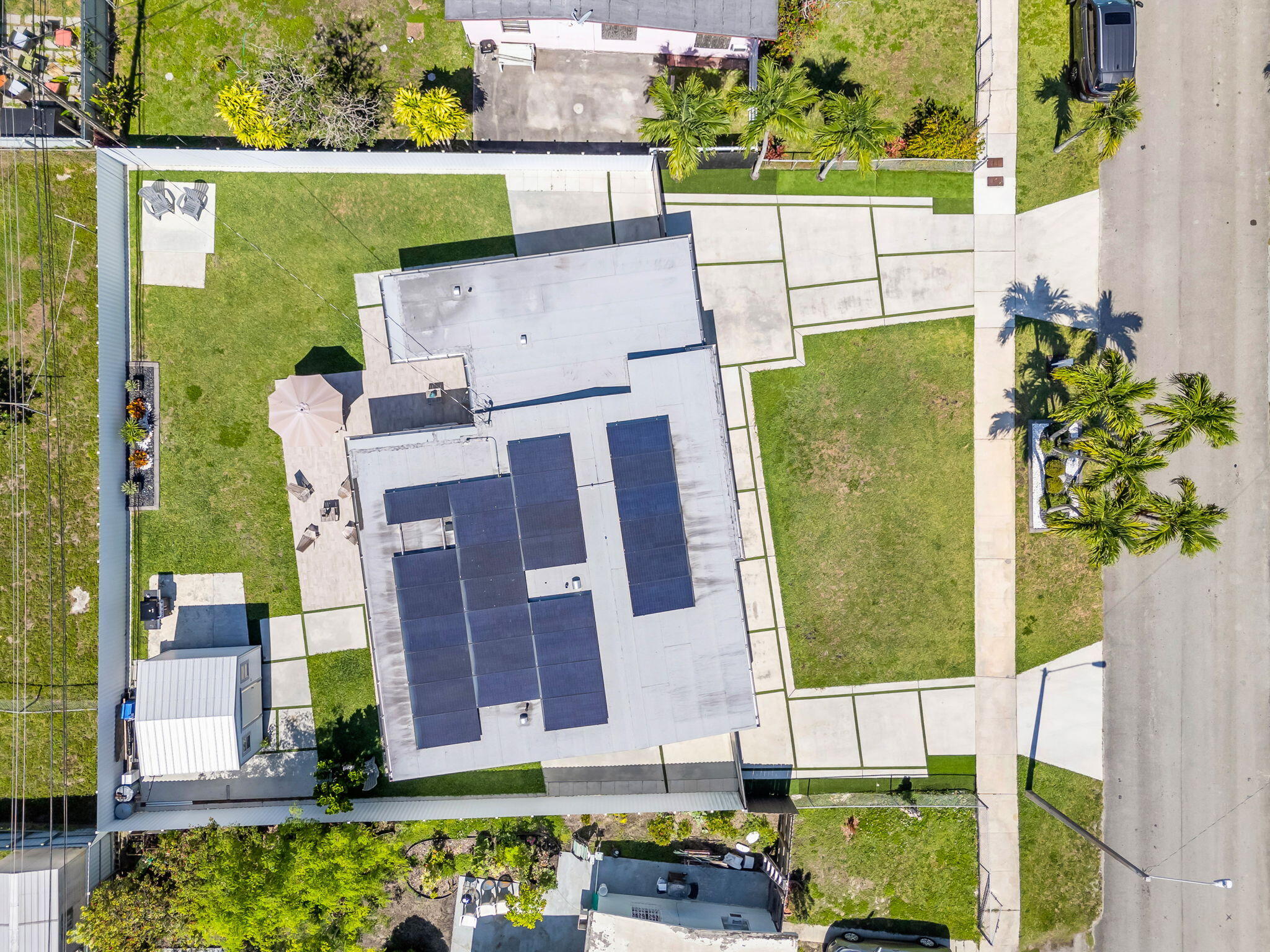 11290 Southwest 48th Street Miami, FL 33165 - Photo 42 of 53 an aerial view of a house with a garden and plants