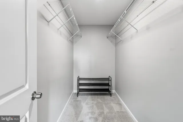 a view of a room with racks on the wall