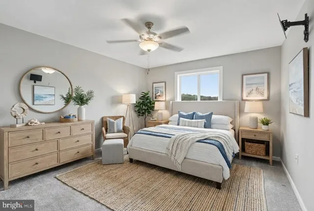 a bed room with a bed and a chandelier